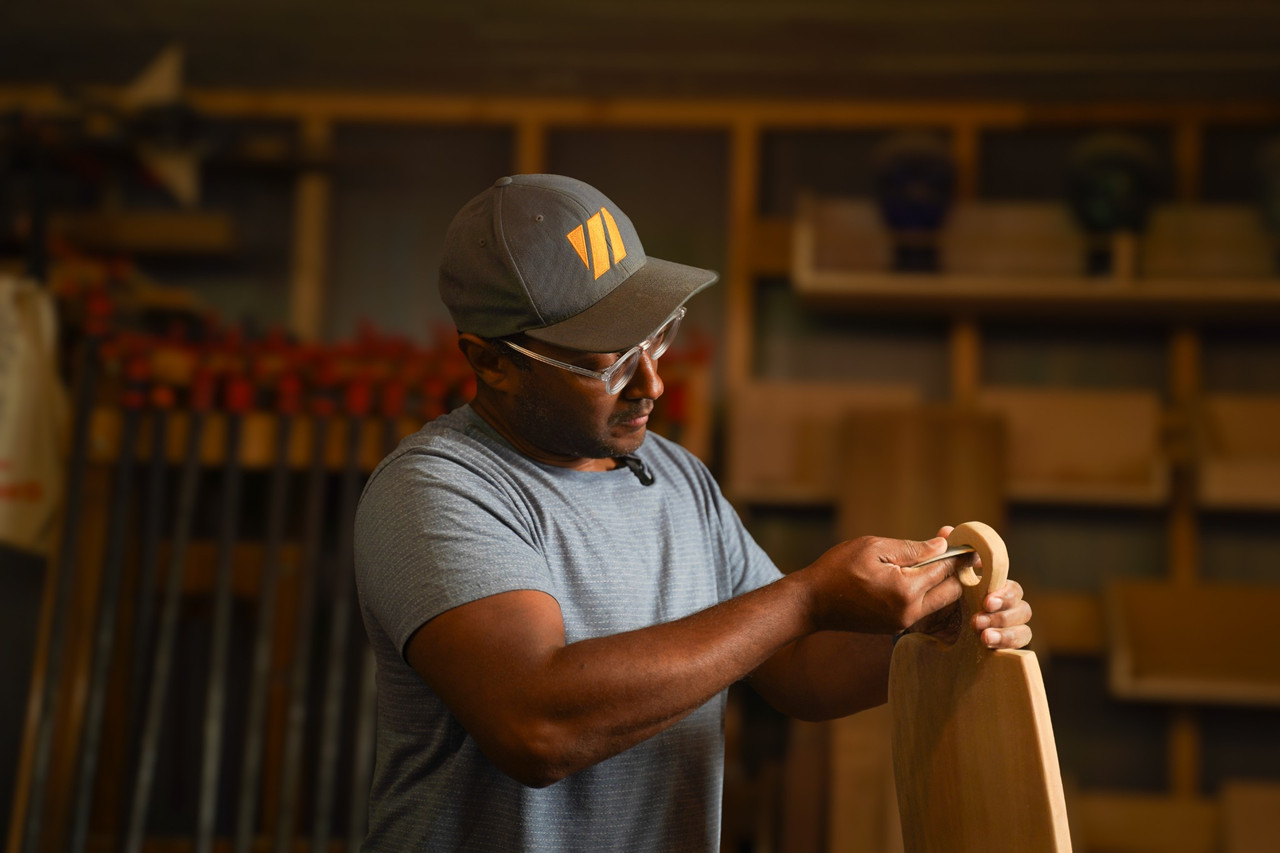 Commercial brand photography of artisan working in a Chicago woodshop