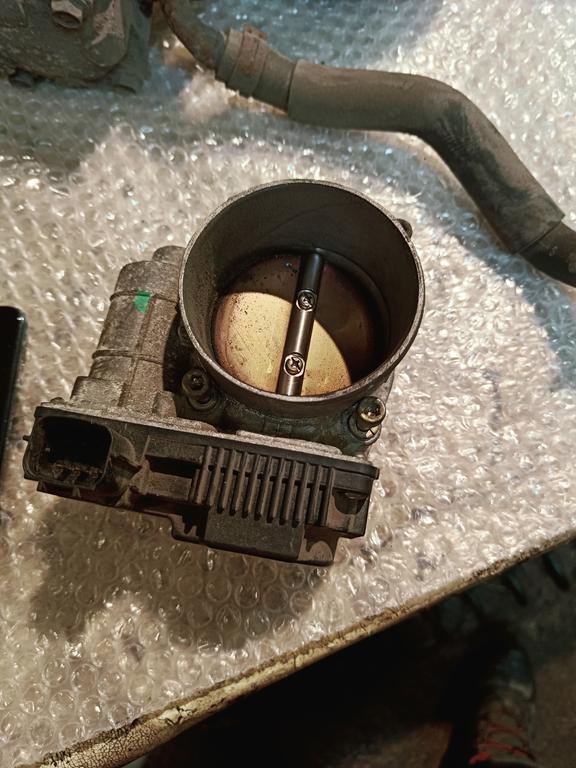 Дроссельная заслонка