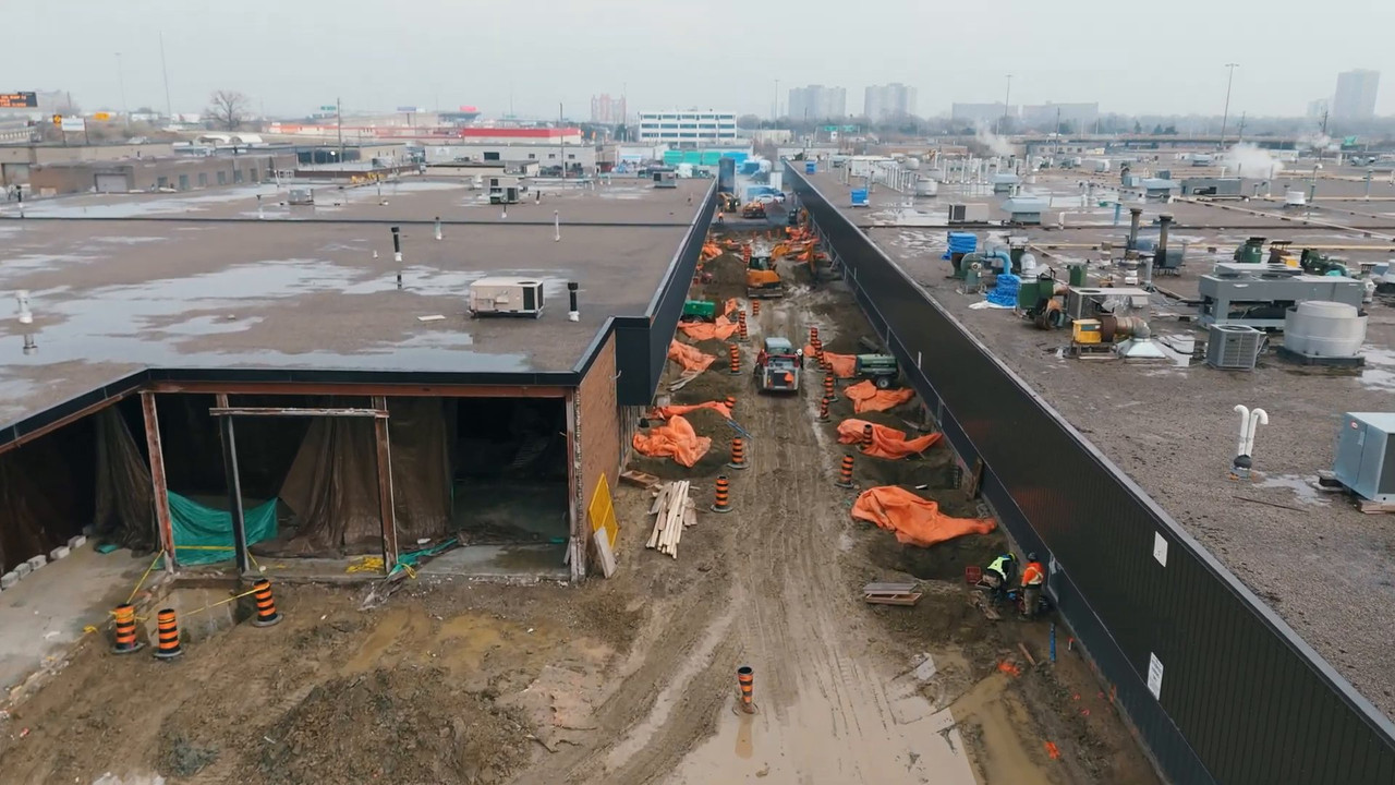 Aerial view down the excavated corridor between the TWI Foods buildings