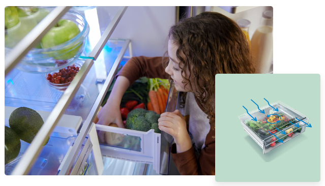 a girl looking at a drawer of vegetables