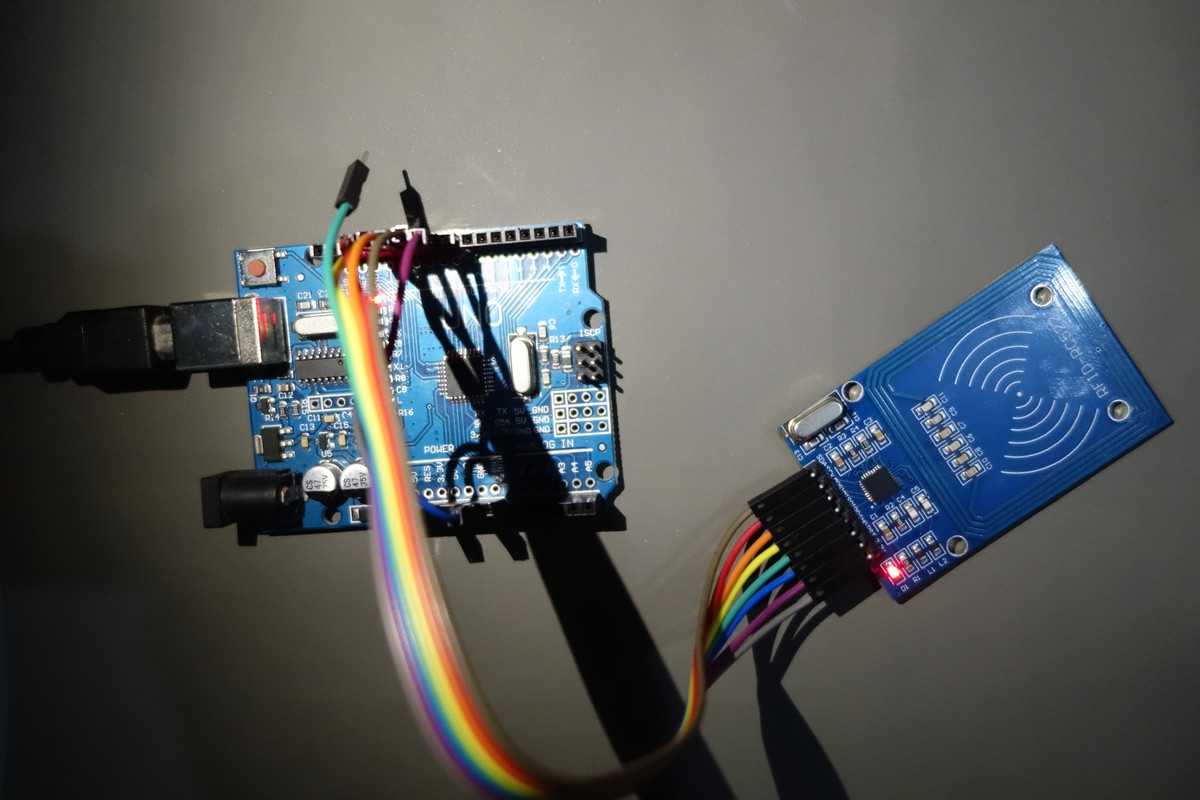 RFID based secure access control system with keycard being scanned at a door lock