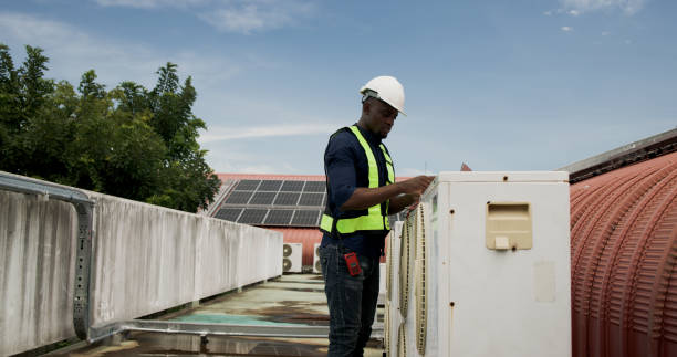 AC Repair Technician at Work