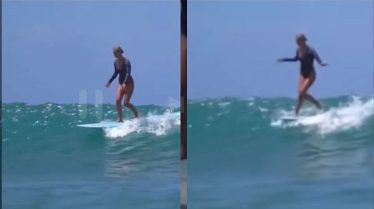 Surfista camina estéticamente en su tabla y llama la atención