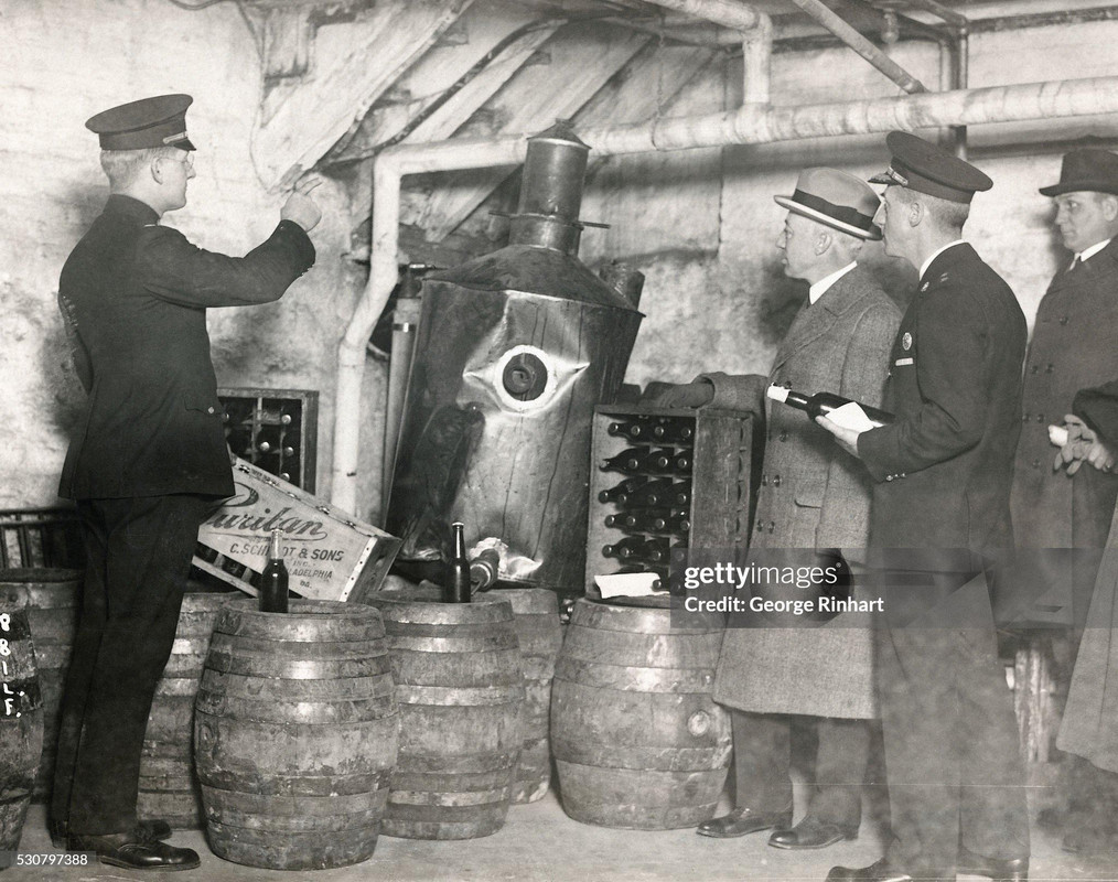 january-17th-1924-director-butler-inspects-a-bottle-of-v0-loryyql2zzcc1