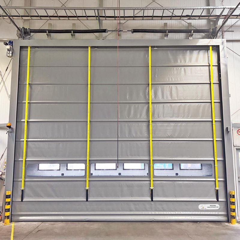 Porte sectionnelle rouge pour caserne de pompiers