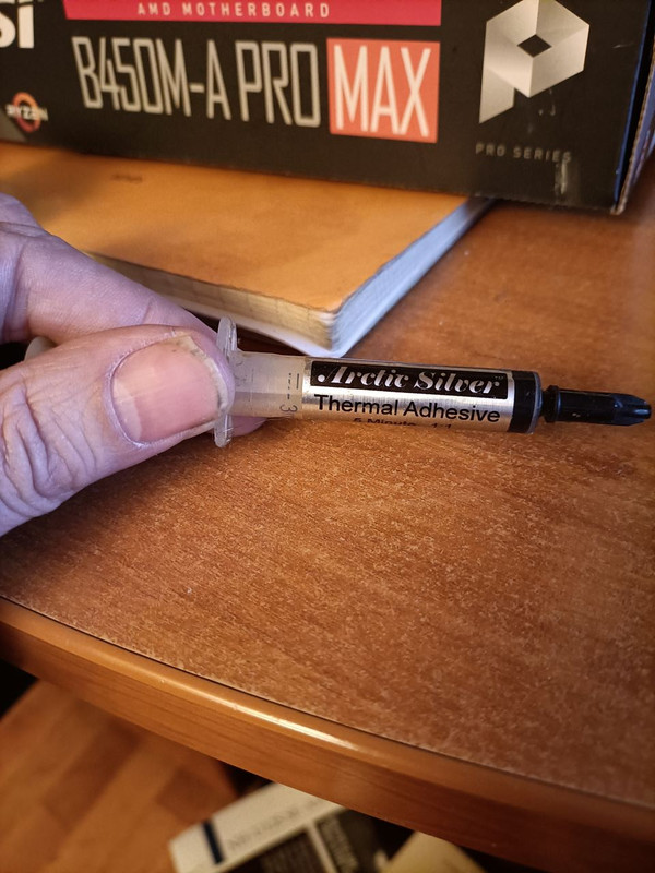 https://i.postimg.cc/tJSdPBy9/artic-silver-thermal-adhesive.jpg
