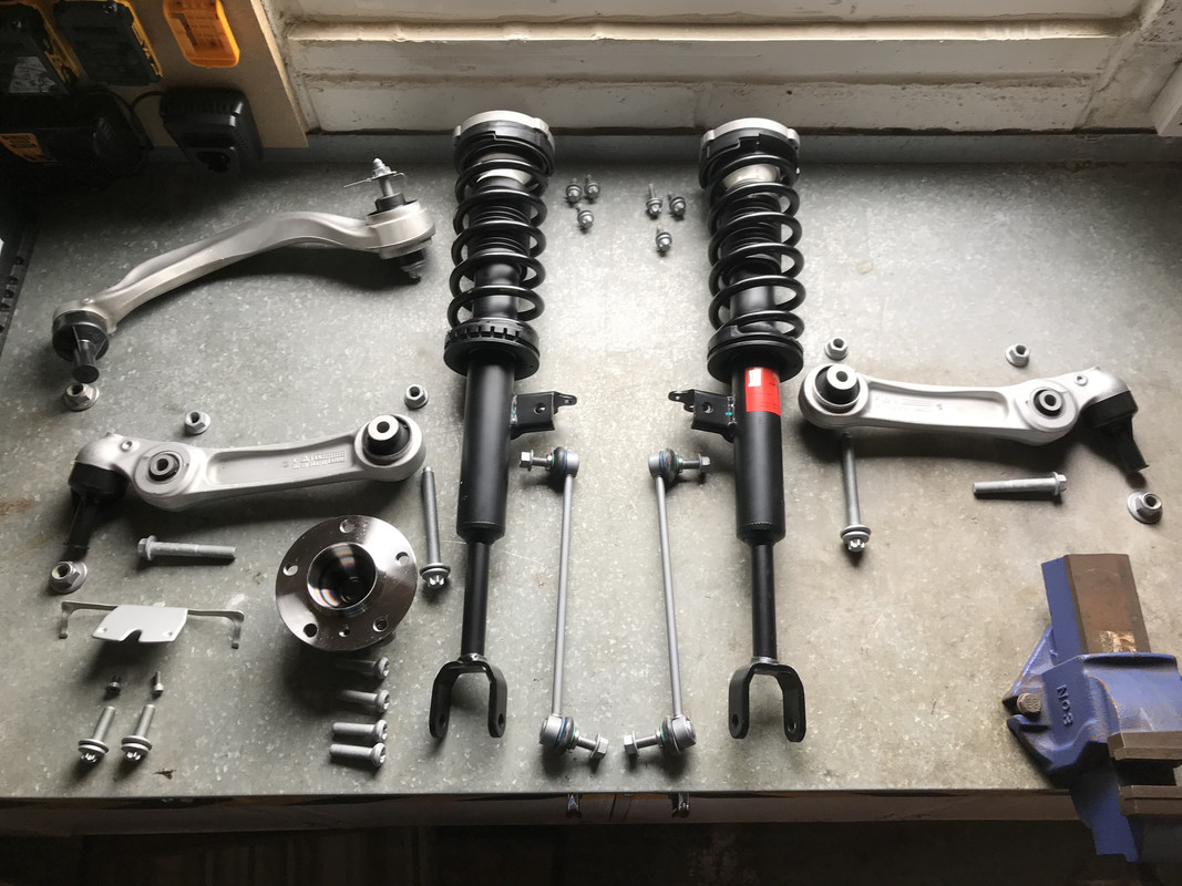 Creaking from front suspension when driving over speed bumps F10, F11