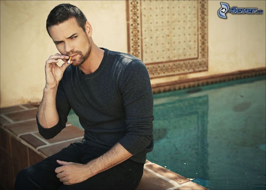 Shane West smoking a cigarette (or weed)
