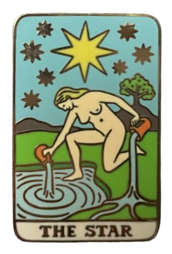 an enamel pin of the rider-waite tarot card of the star