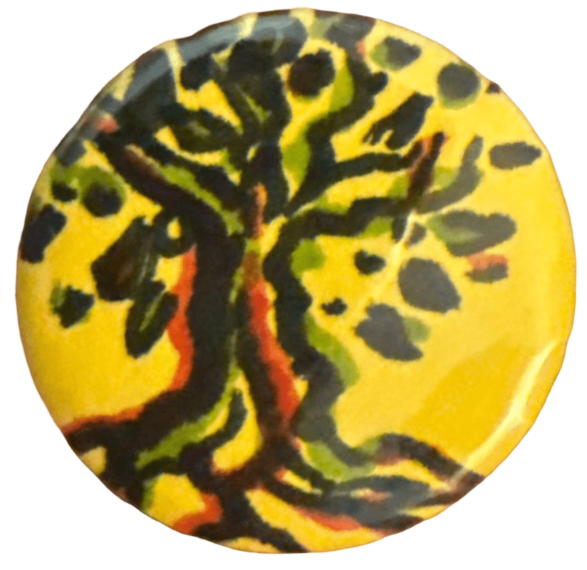 a yellow pin with an olive tree drawn on in black, red, and green, which i got from the SJP table at an introduction day at my university