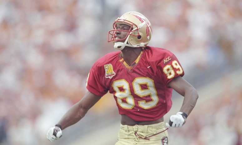 Wayne Messam of the Florida State Seminoles looks for the ball during a game against the Florida Gators at Doak Campbell Stadium in Tallahassee, Florida in 1996