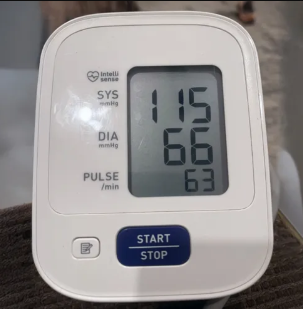 Blood pressure monitor reading 115/66 (before)