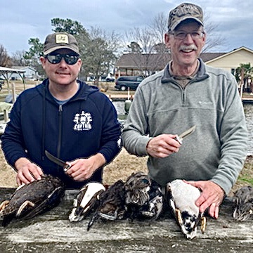 12-17-19-Justin-and-me-cleaning-ducks-Buck-121-Buck-212.jpg