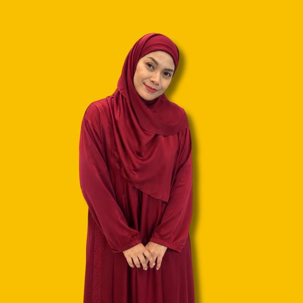 Puan Kemn Azmaili dan buku yang dihasilkan menggunakan Canva
