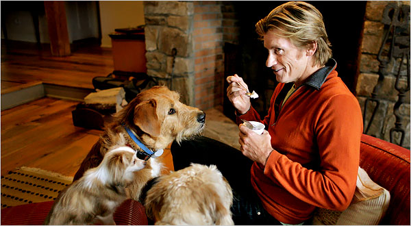 Denis feeding his dogs