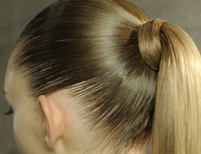 Blonde with tight ponytail