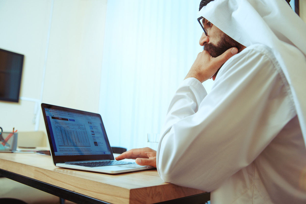 arabian-saudi-businessman-working-in-office-2021-08-26-17-42-59-utc