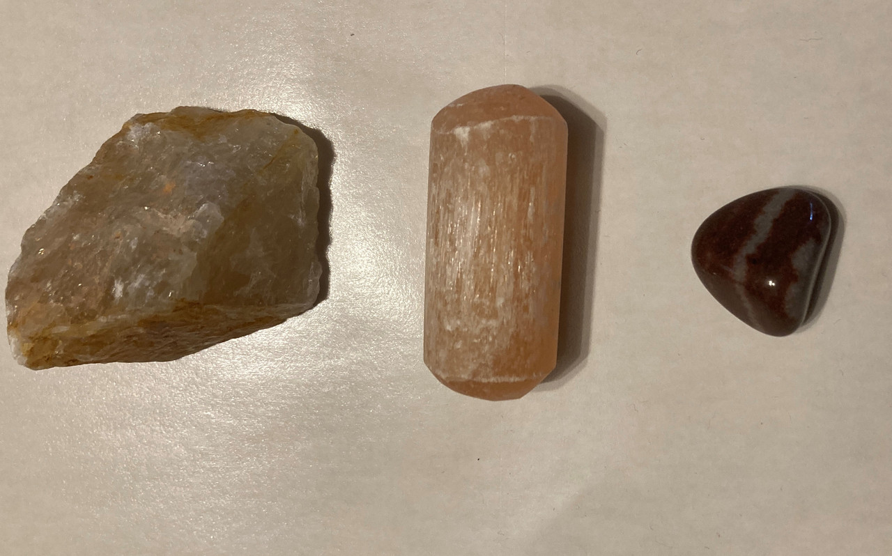  raw golden healer quartz, tumbled orange selenite, tumbled Narmada, information sheet