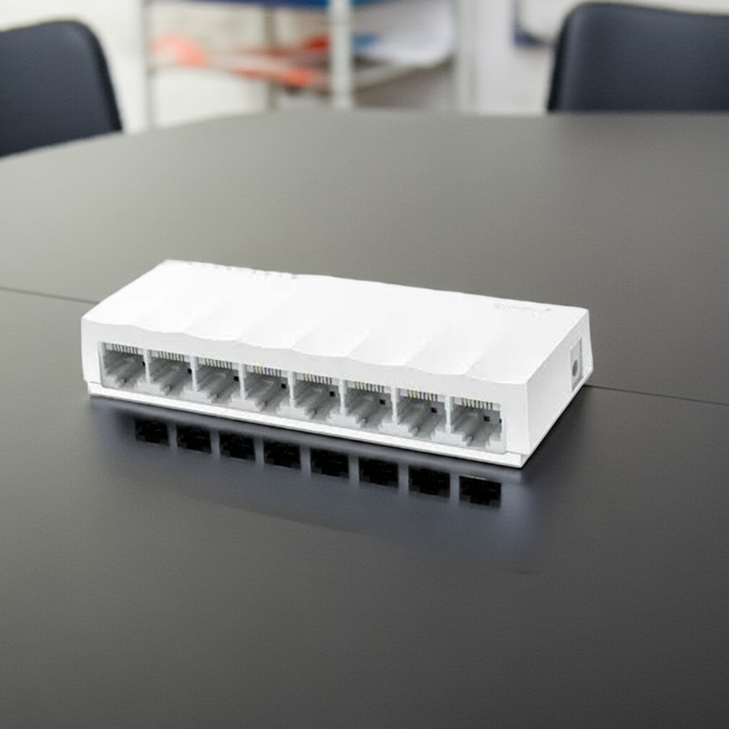 Vista lateral do Switch TP-Link LS1008, mostrando o design elegante e compacto para mesa.