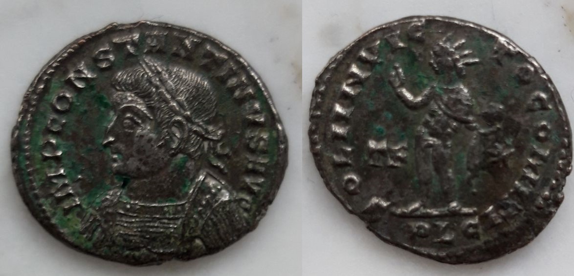 Nummus de Constantino I. SOLI INVICTO COMITI. Sol a izq. Lyon C1plg1