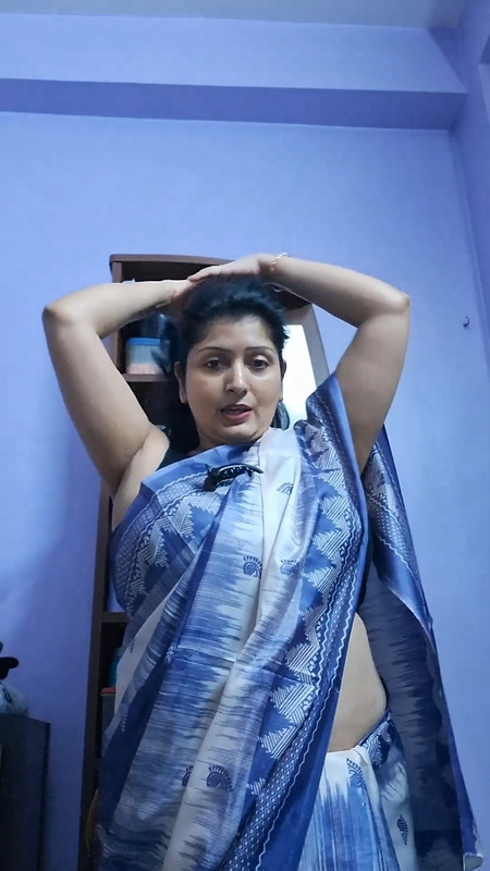 Bengali Fleshy aunty sexy armpits wide belly and deep navel show in blue saree.mp4_snapshot_01.47.24