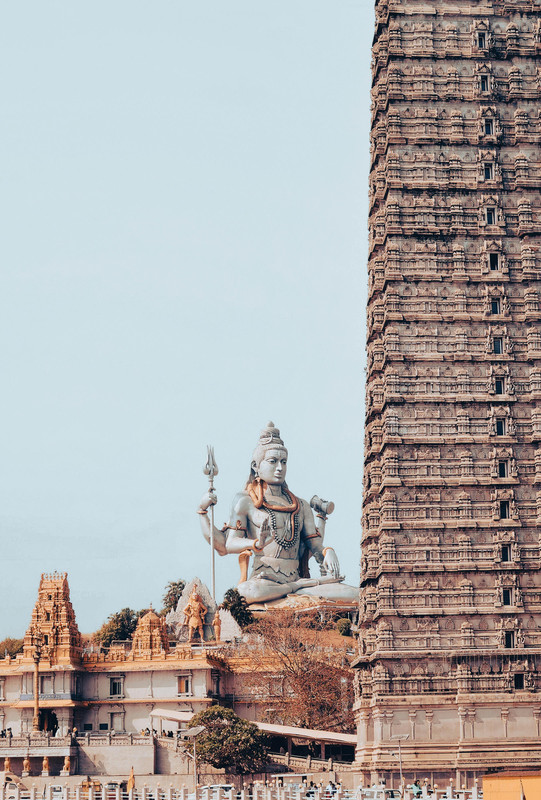 Mahadev statue seen from distance - reflective scene