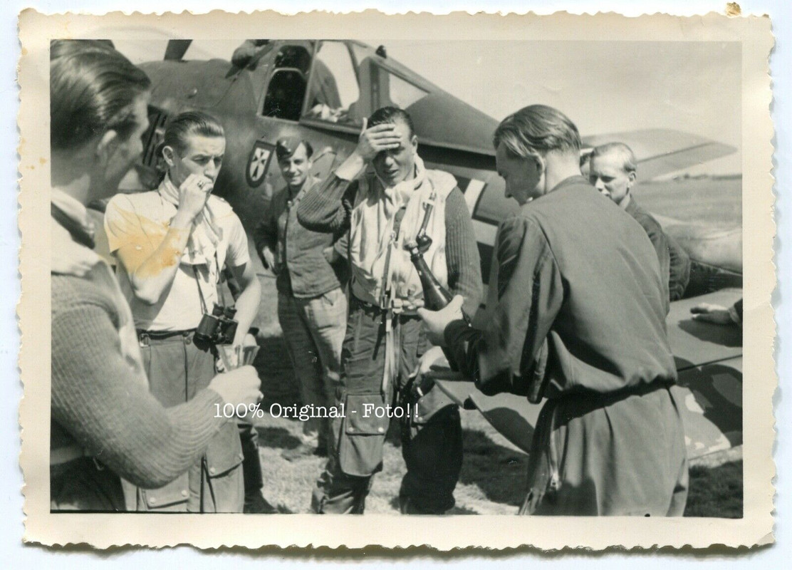 Focke-Wulf-Fw-190A4-JG1-Yellow-11-with-pilot-being-celibrated-ebay1