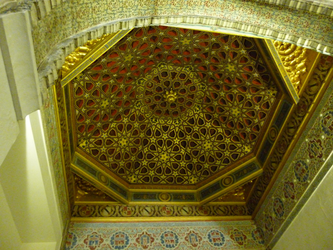 Another carved wooden ceiling, this time the shapes are pentagons, but two of the sides are longer than the other 3.  In the centre of each cluster is a star design.  The carvings are covered in what I think is gold leaf, except the pentagons.