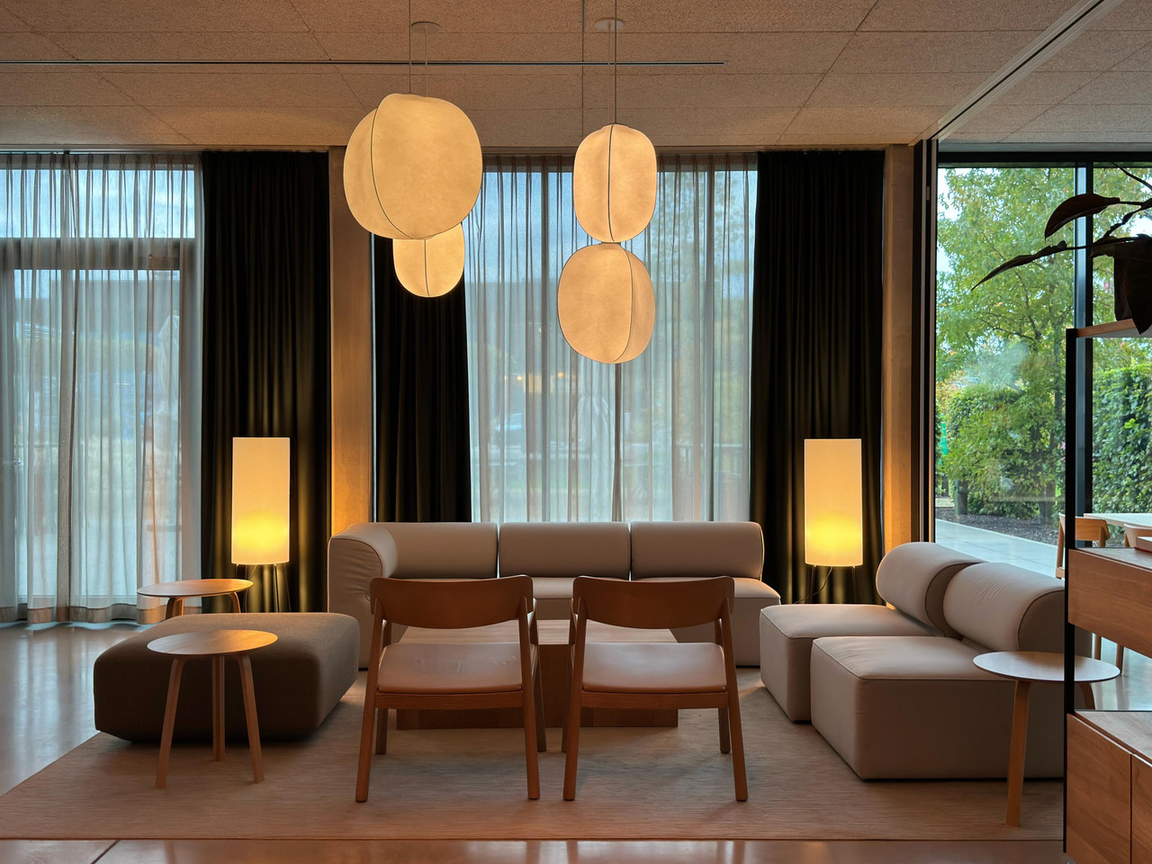 Layered lighting in the Coreum Hotel lounge with localised architectural and decorative light