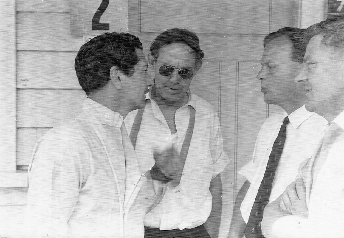 6599 AMB Left) and officials — Postimages