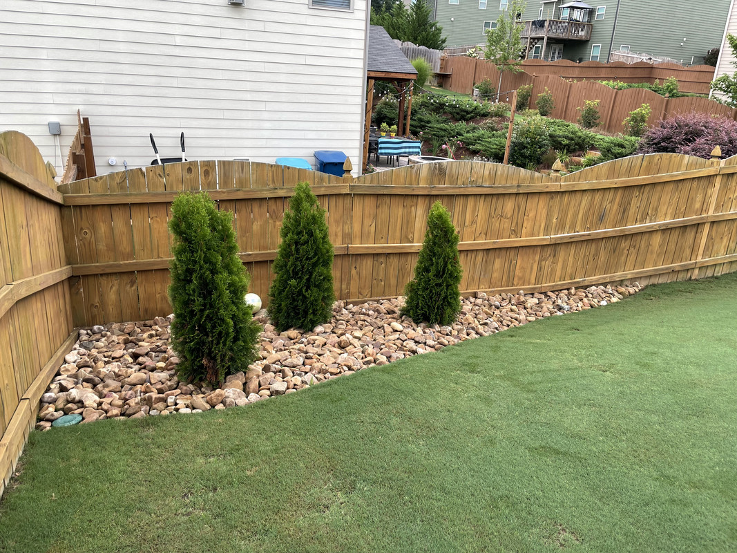 Rock border along fence line Lawn Care Forum