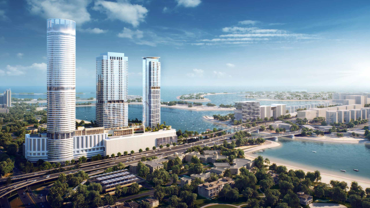 Luxury waterfront exterior of Palm Beach - Tower 3 at Palm Jumeirah by Nakheel, showcasing the modern glass tower rising above the shoreline with panoramic Dubai skyline views — Palm Beach - Tower 3 Distress Deal investment opportunity