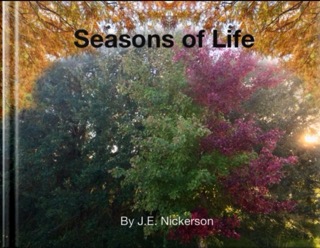 Purple and green tree standing tall in a lush, serene forest setting.