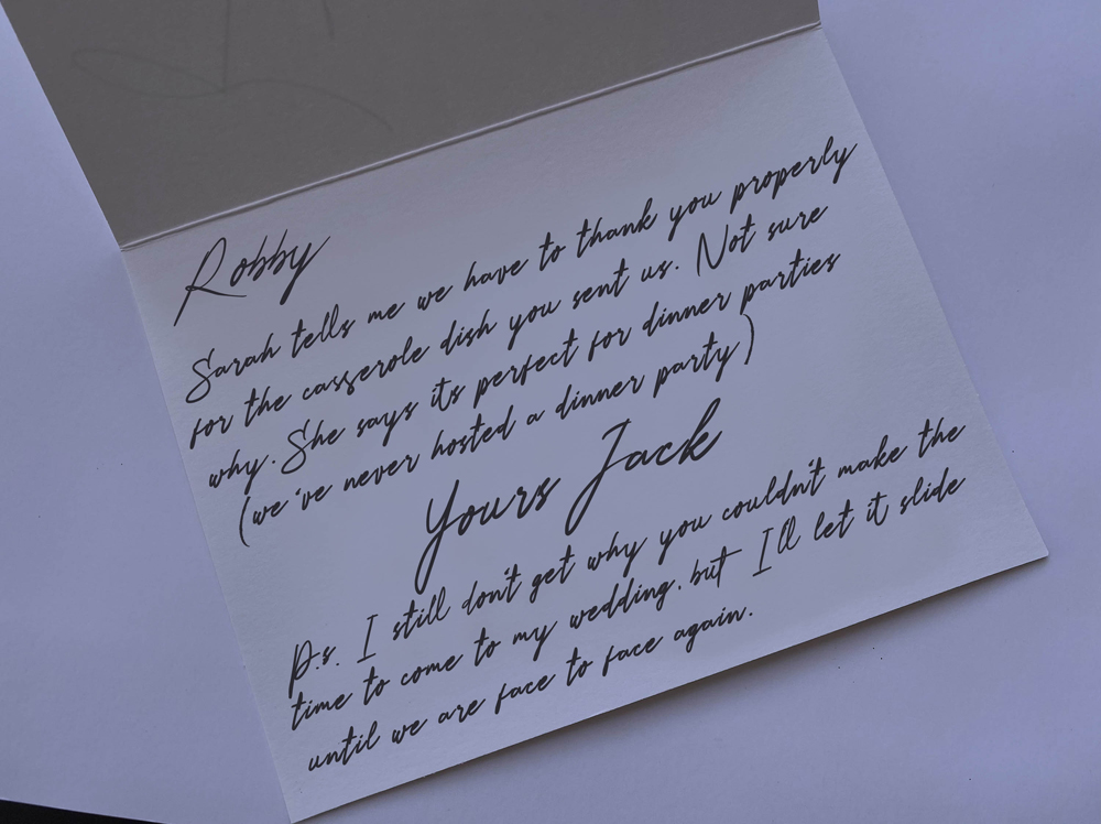 The inside of a handwritten card from Jack to Robby. Jack thanks him for the casserole dish he sent as a wedding present. He also comments on the fact that Robby didn't come to his wedding