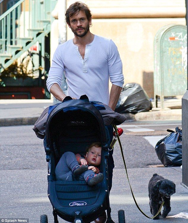Hugh-Dancy-pushes-son-Cyrus-in-stroller-and-walks-dog-in-New-York-City.jpg