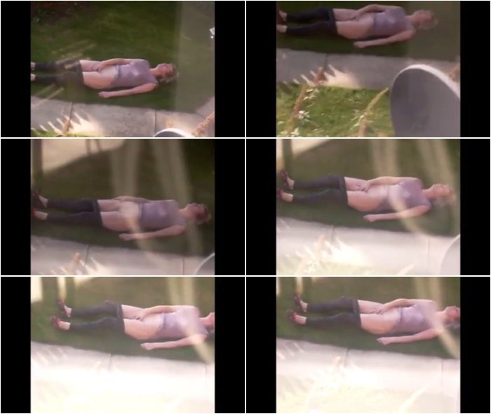 [Image: Voyeur-from-hotel-window-woman-on-grass-playing-3.jpg]
