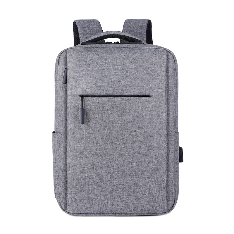 2026 hot-selling custom slim business laptop backpack with USB charging port placed on luggage case, featured as best B2B corporate gift choice