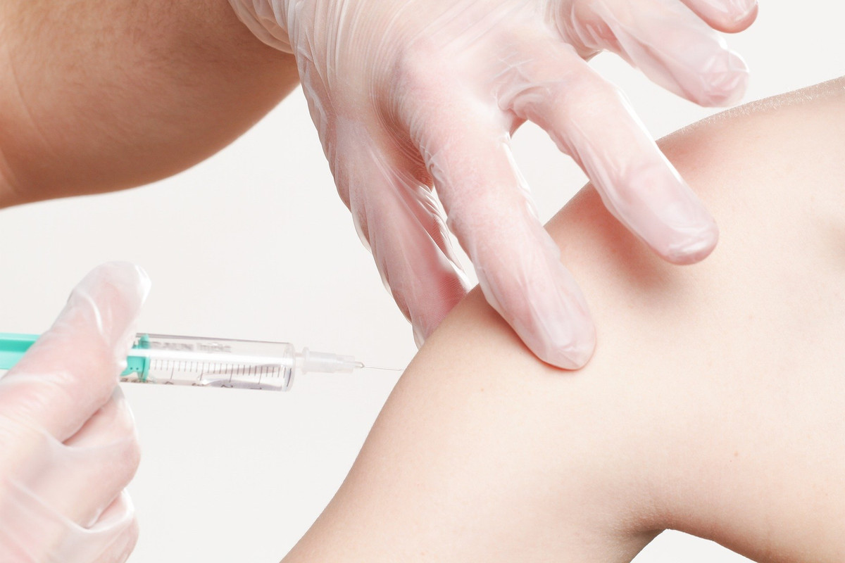 A person receiving a vaccine.