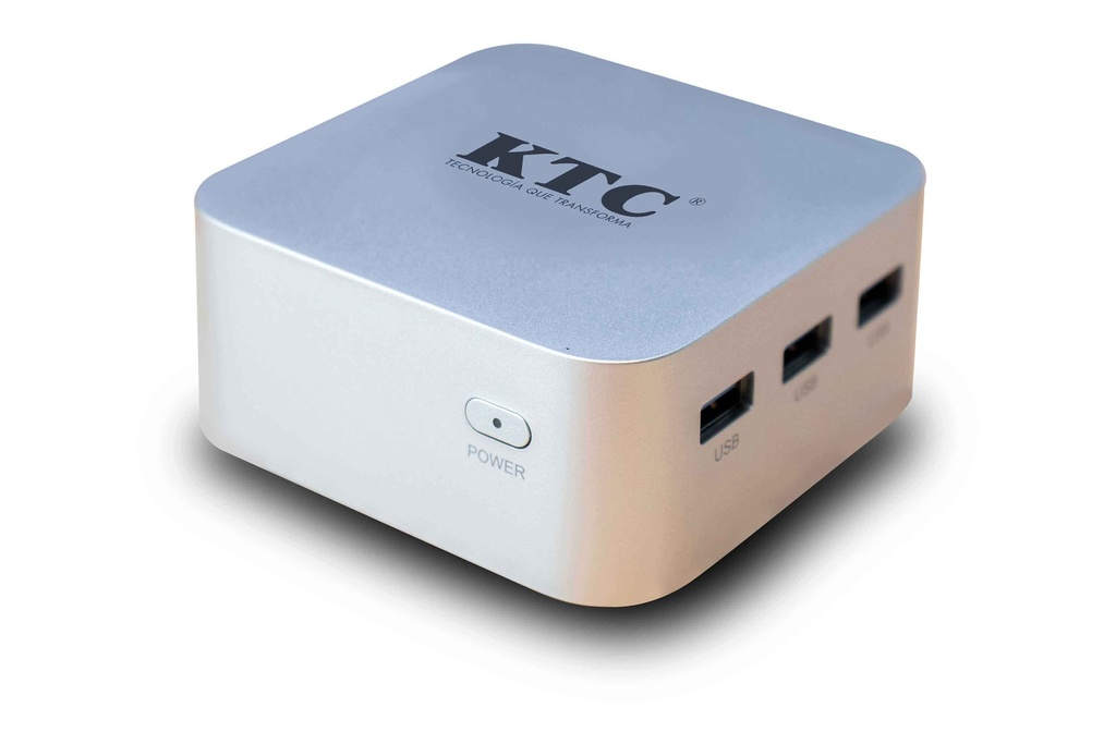 Mini PC KTC SK012 en color plateado, mostrando su diseño diminuto.