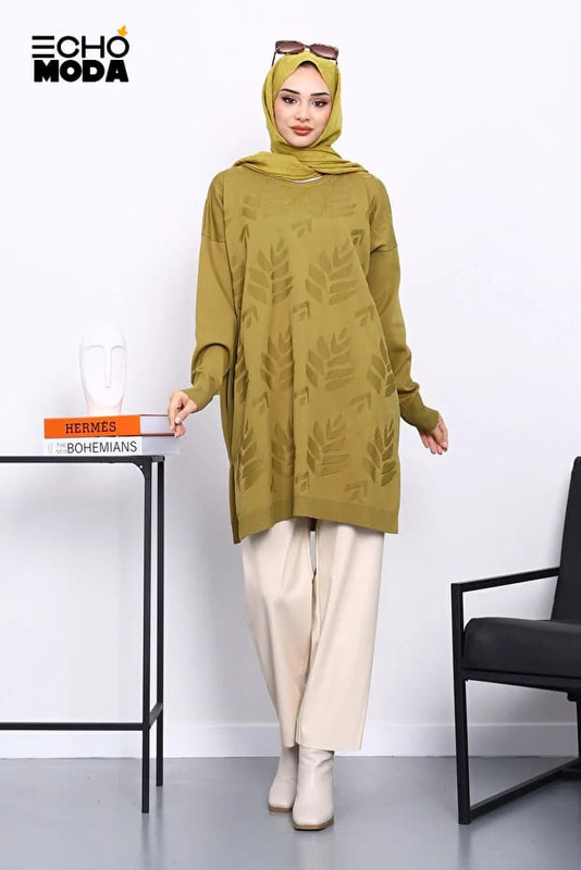 تونيكات طويلة بالبنطلون: إطلالة محتشمة بلمسة راقية تونيكات طويلة بالبنطلون: إطلالة محتشمة بلمسة راقية