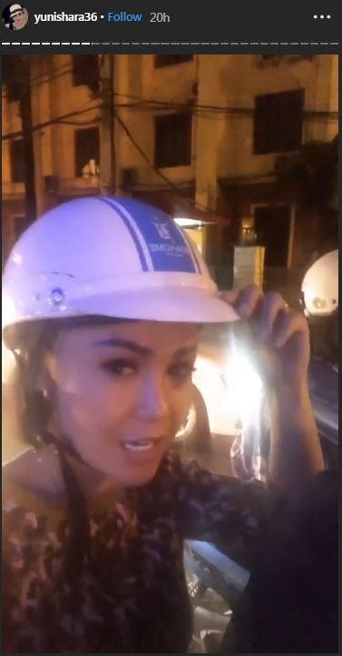 Yuni Shara naik ojek di Vietnam