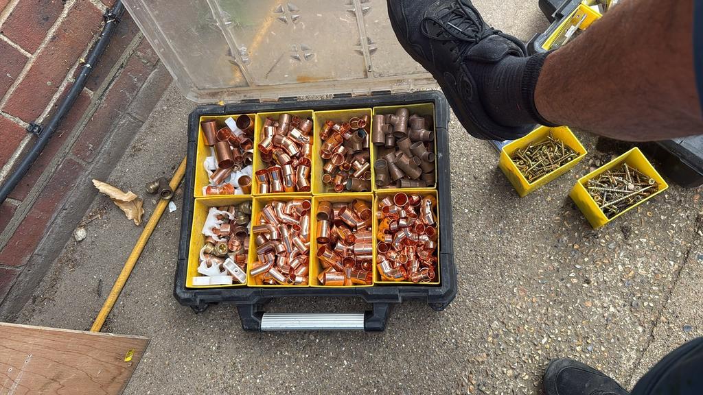 Organiser case packed with copper pipe fittings
