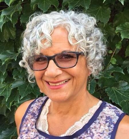 What is the best hairstyle for a 65 year old woman with curly hair?