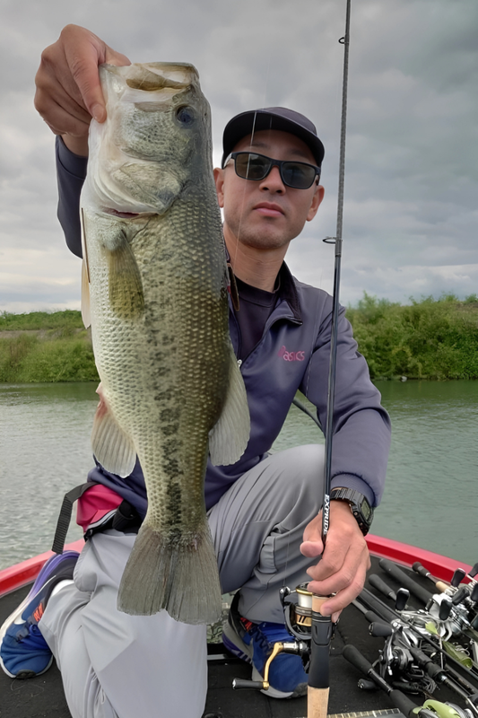 Jenna holding a largemouth bass