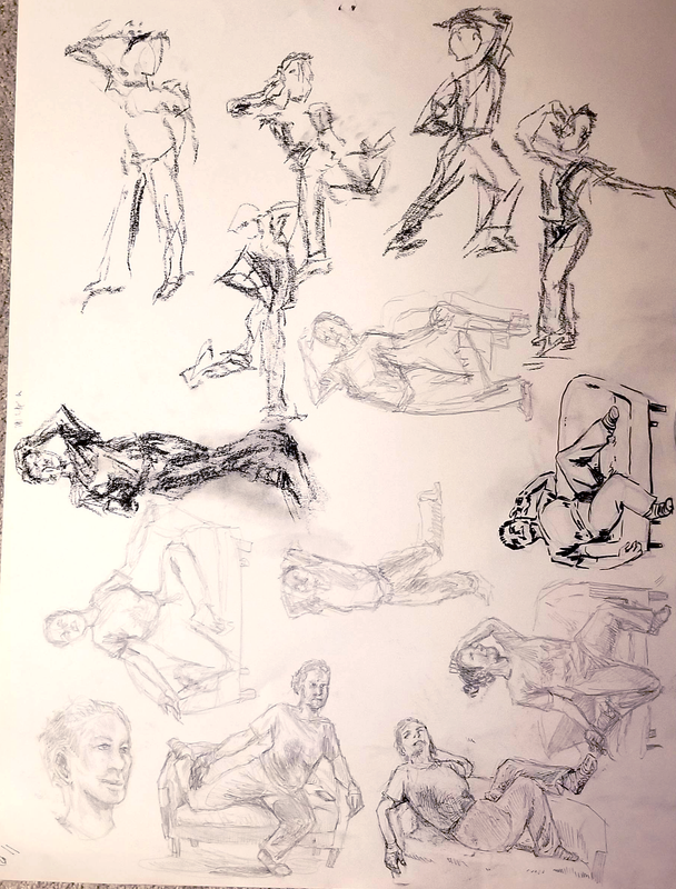 a poor quality photo of a large sheet of paper full of sketches of a person from a figure drawing session.
