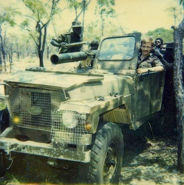 soviet-military-advisor-sergei-mishchenko-with-a-captured-v0-n0wuaxh4l75e1.webp