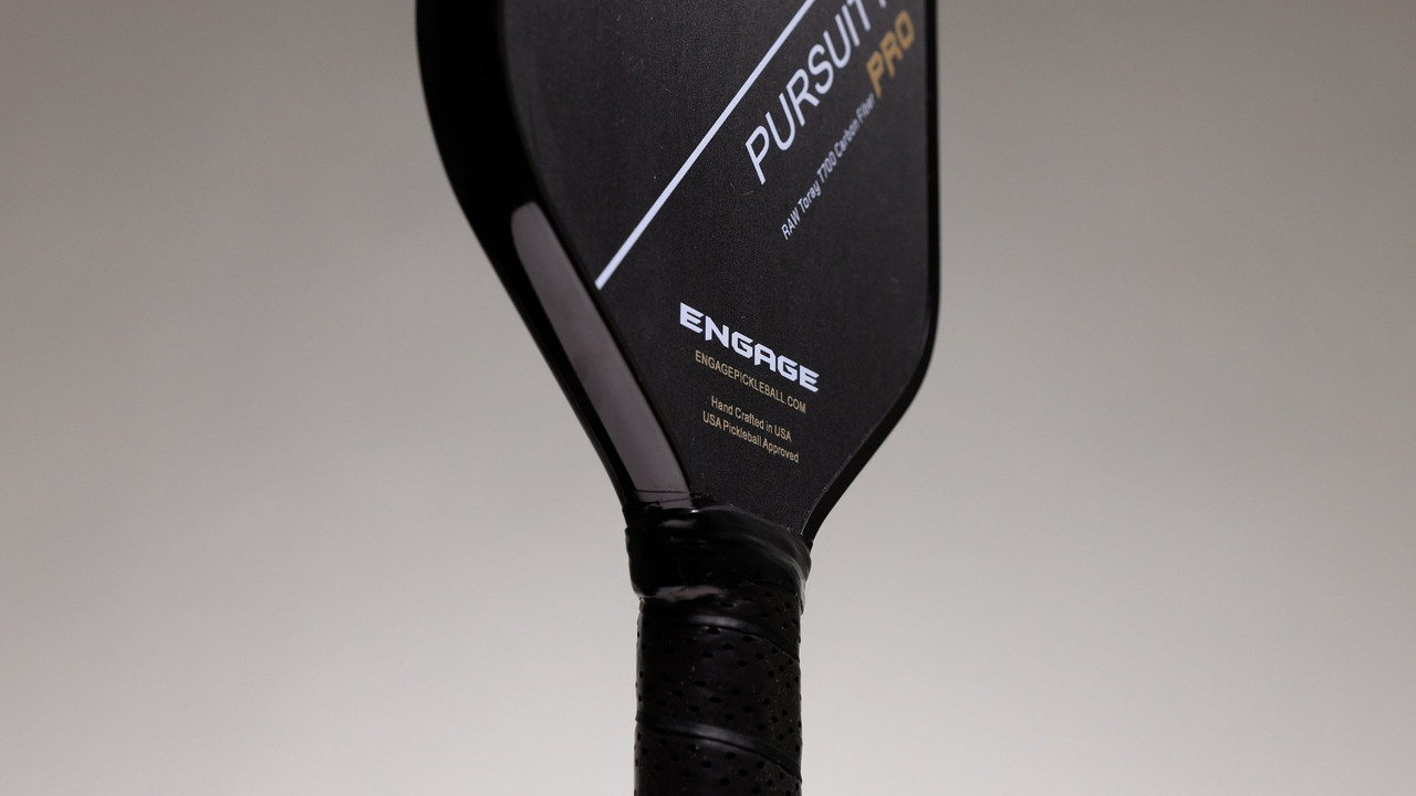 Detailed view of the Engage paddle's durable edge guard, showcasing build quality.