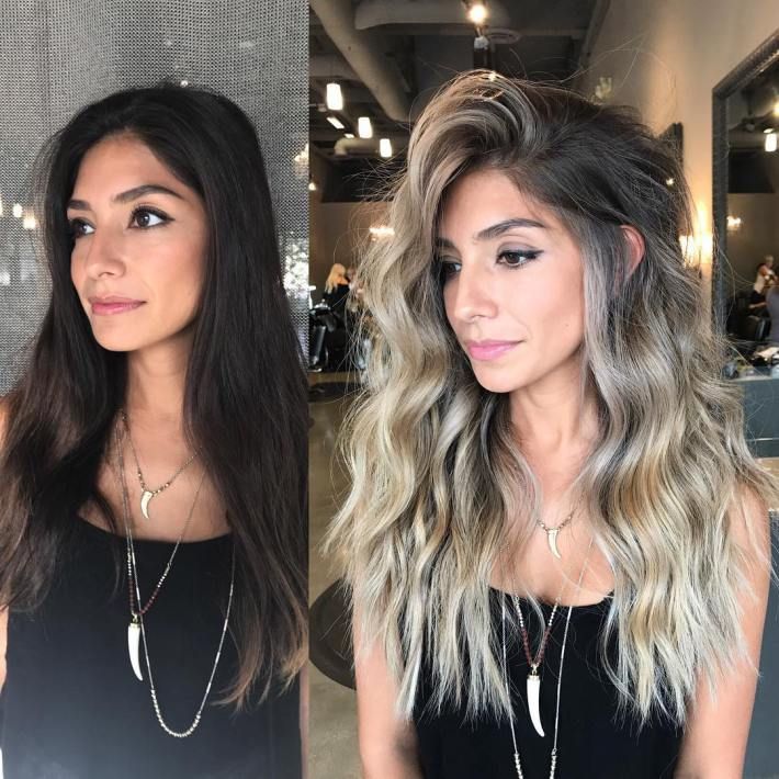 A girl with long black hair changed the color to ombre blonde
