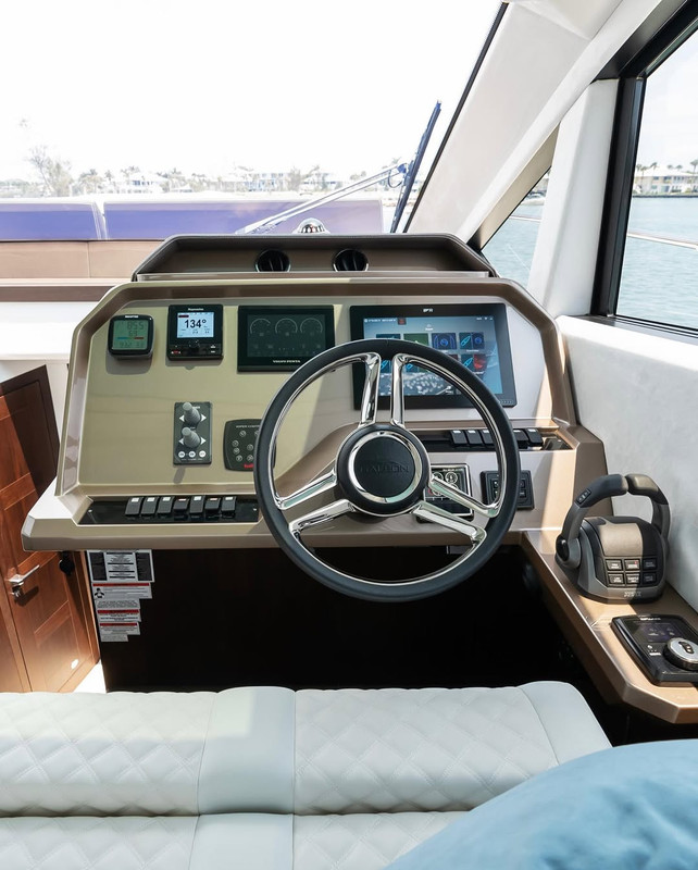 Meticulous primary cabin interior stateroom layout under soft luxury linen