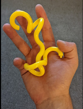 a toy that helps with fidgeting that looks like a bunch of macaroni all stuck together